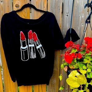 Torrid sweater fits like a large - not tight lighter weight sweater.